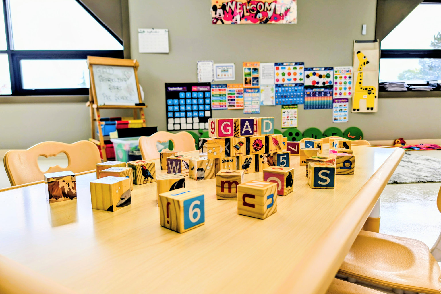 Preschool children learning together with an educator